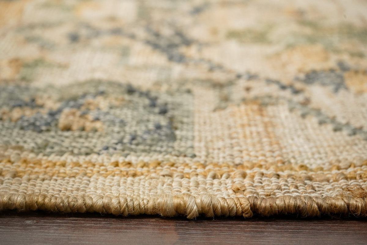 Sage green jute rug styled in living room