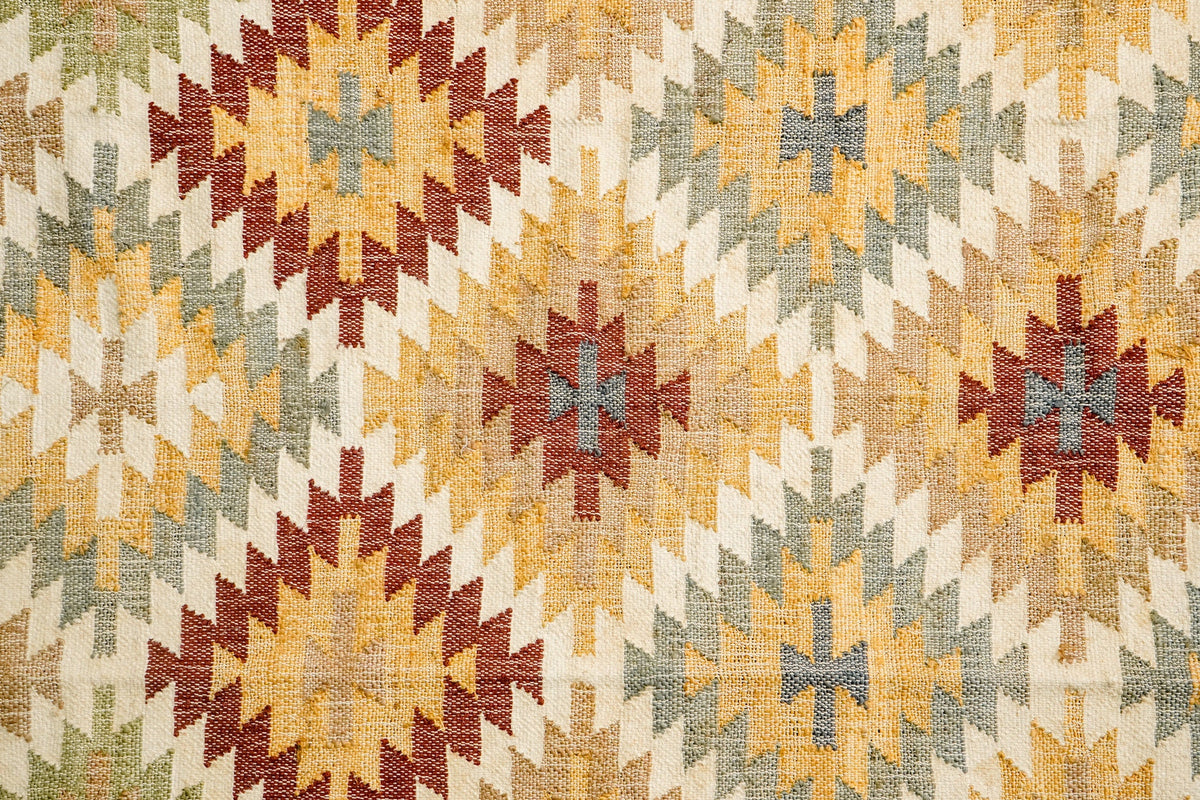 Full flat lay of natural jute Aztec rug