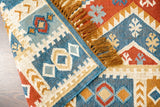 Reversible kilim rug shown rolled to display both sides