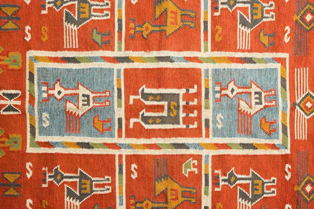 Red tribal aztec kilim rug outdoor patio setting
