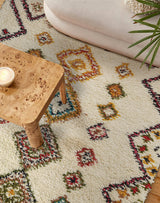 Moroccan wool rug placed in bedroom setting