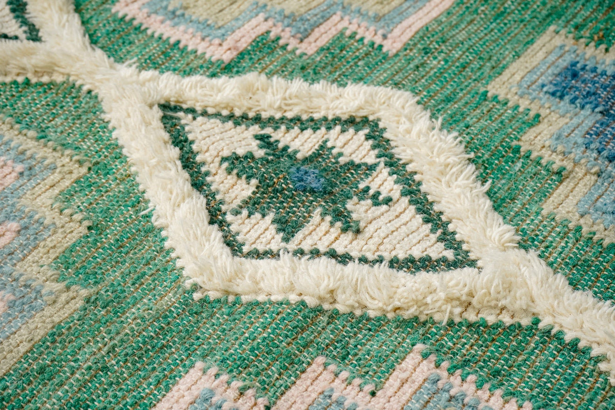 Full flat lay of sage green Moroccan rug