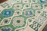 Green kilim rug under coffee table in living space