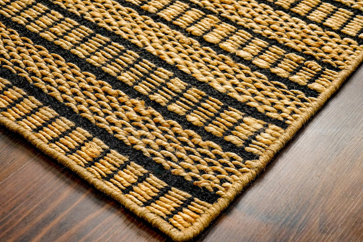 Ribbed jute rug styled with furniture in room