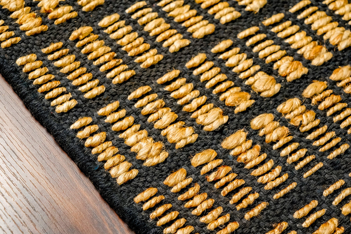 Jute grid rug texture close-up in natural light