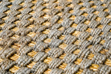 Chunky grey jute area rug, flat lay view