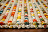Full top-down view of striped wool rug