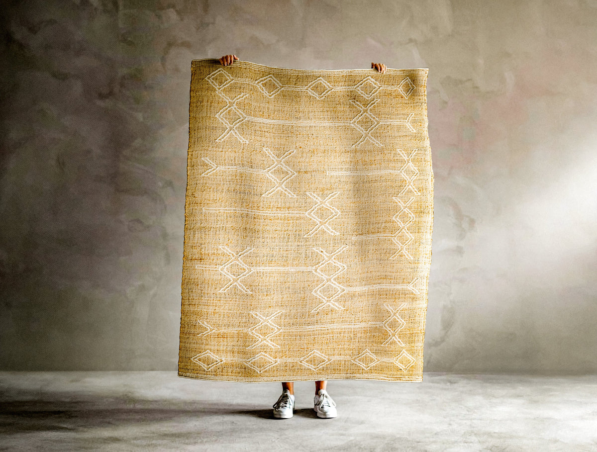 Corner detail of geometric wool jute rug