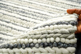 Grey and ivory chunky loop wool rug weave close-up