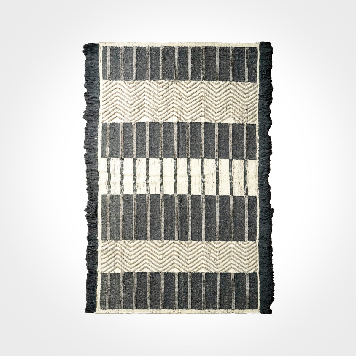 Rug styled under scandinavian furniture