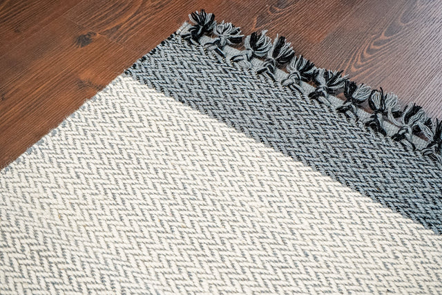 Scandinavian grey rug styled in a living room
