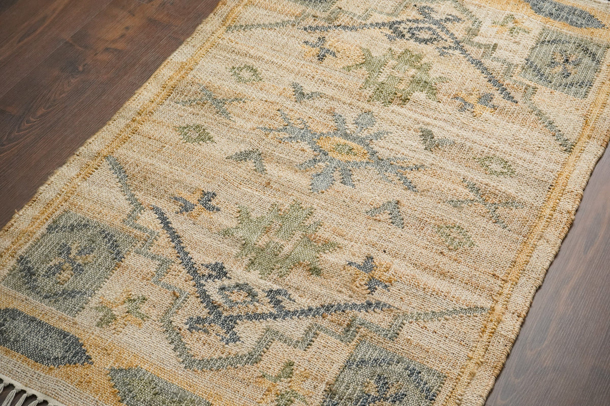 Sage green jute rug texture close-up