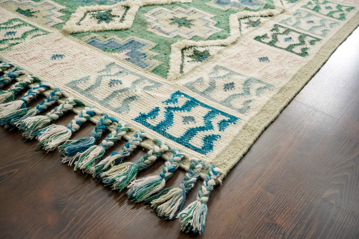 Close-up of sage green wool weave texture