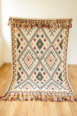 Colourful flatweave kilim rug flat lay