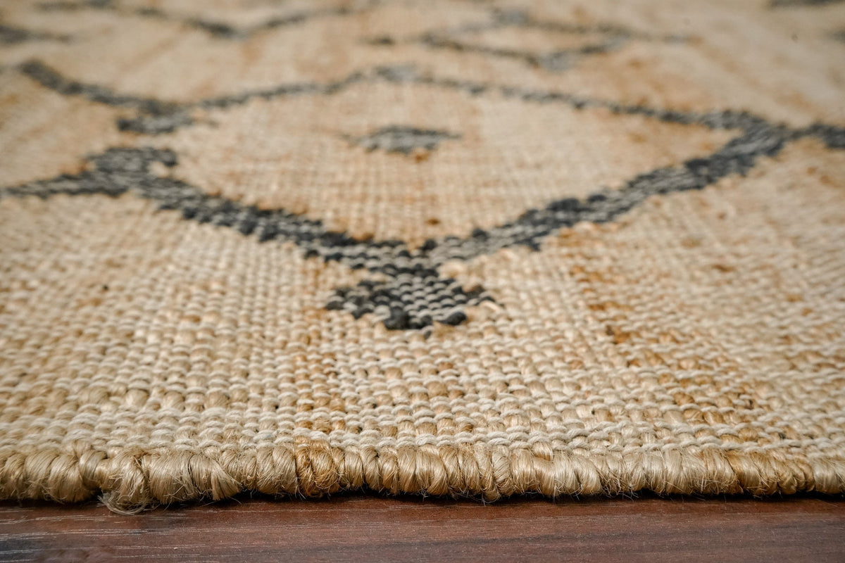 Jute area rug in a hallway or entryway setting