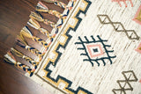 Corner detail of ivory Aztec kilim rug