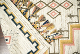 Overhead view of ivory Aztec kilim rug