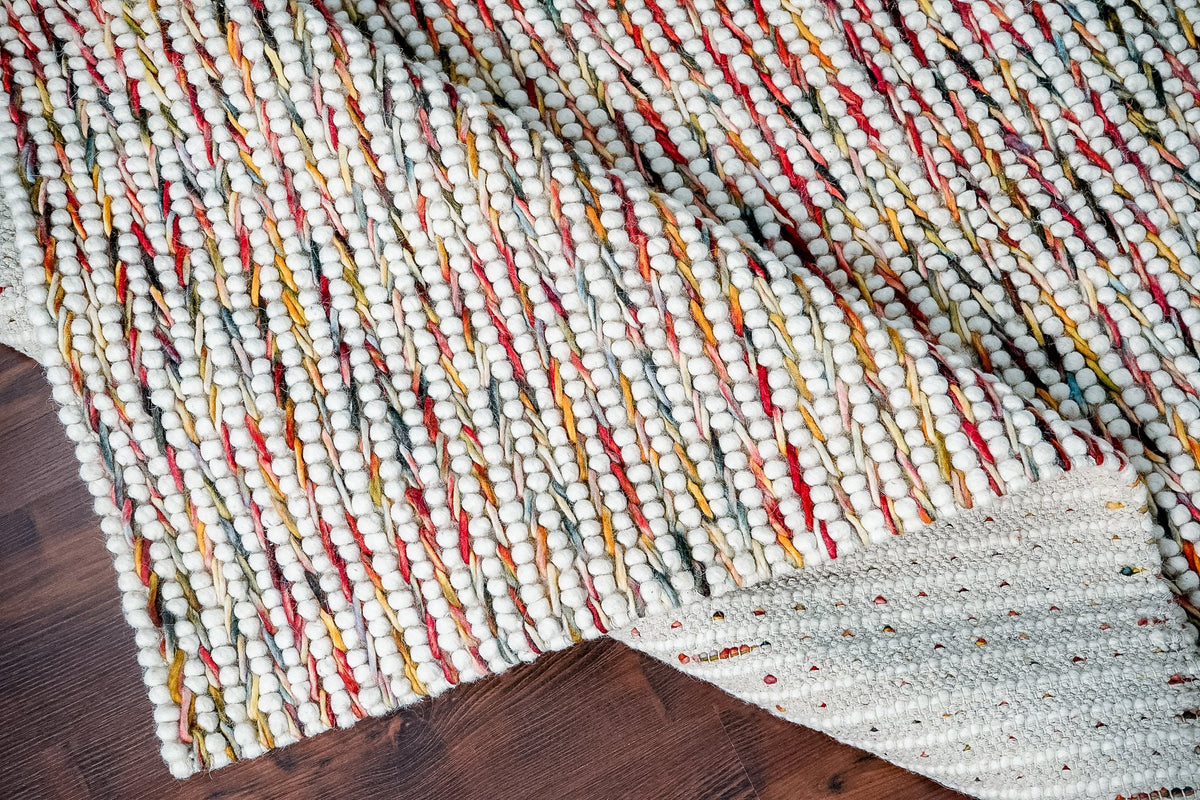 Close-up of multi colour wool loop texture