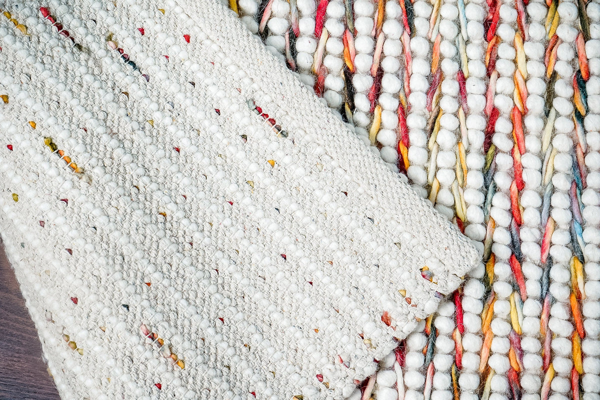 Colourful wool rug in a playroom setting