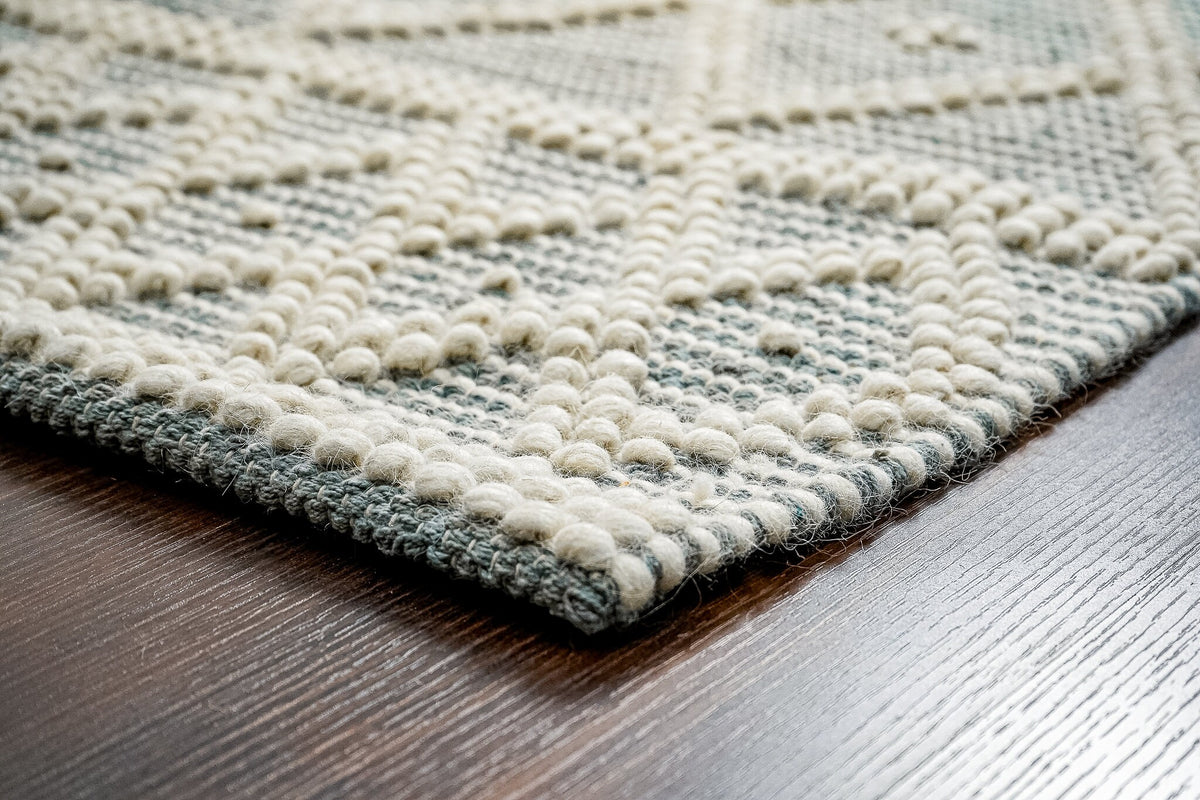 Close-up of grey abstract loop wool texture