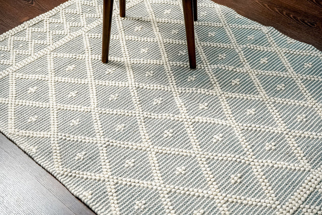 Grey abstract chunky loop wool rug flat lay