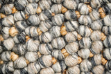 Charcoal grey wool jute rug corner detail