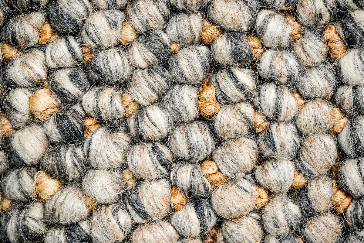 Charcoal grey wool jute rug corner detail