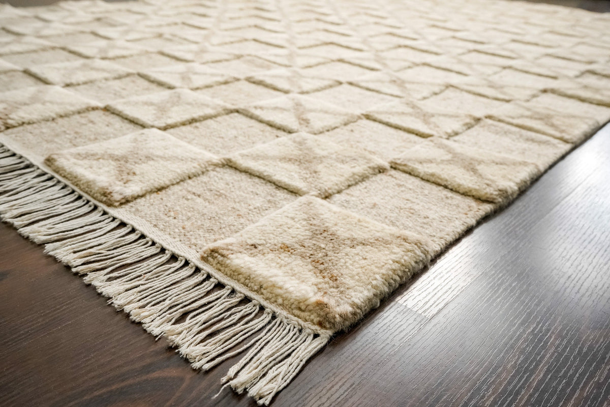 Taupe wool rug texture close-up detail shot
