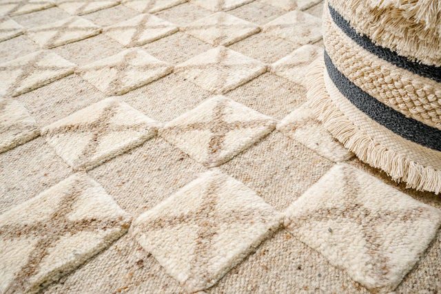 Taupe wool rug flat view showing geometric pattern