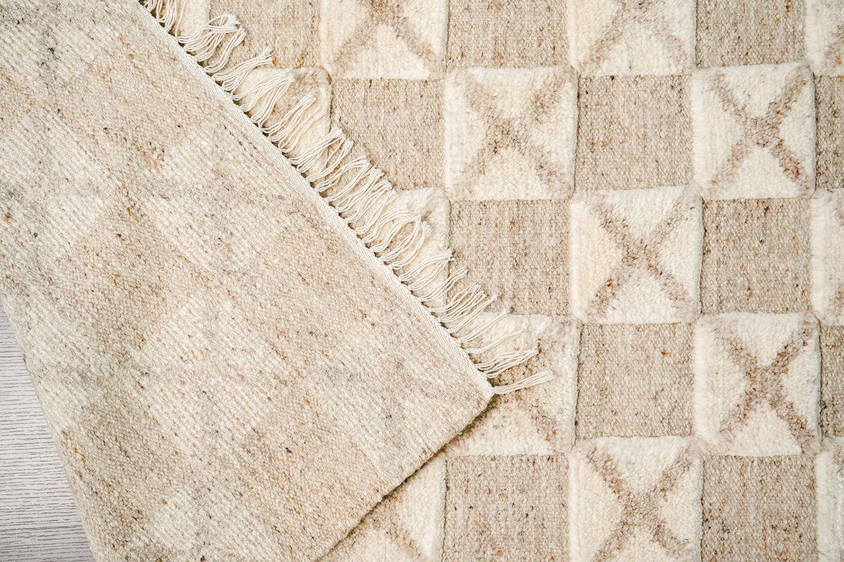 Full room view with taupe wool rug