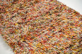 Rainbow shag rug corner detail