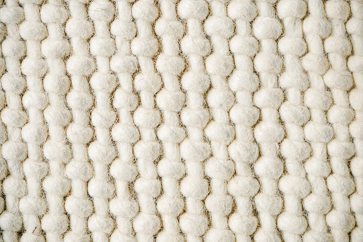 Ivory loop chunky wool rug, flat lay view