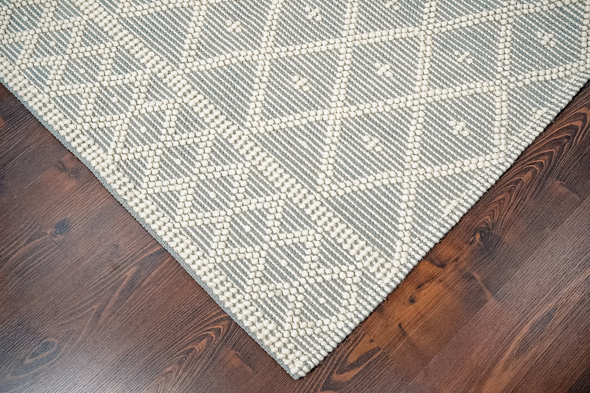 Grey wool rug corner and edge detail