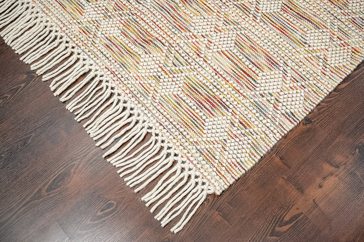 Chunky looped wool rug laid in a kids playroom