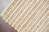 Chunky striped rug styled in a living room setting