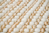 Corner detail of wool jute chunky rug edge
