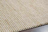 Natural wool jute rug styled with farmhouse decor