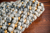 Charcoal grey rug pile close-up