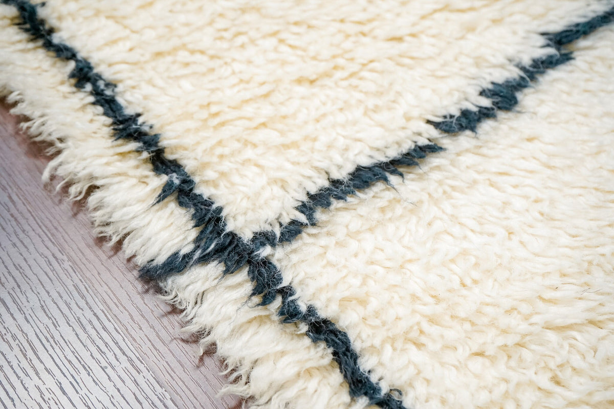 Abstract pattern wool rug texture close-up under natural light