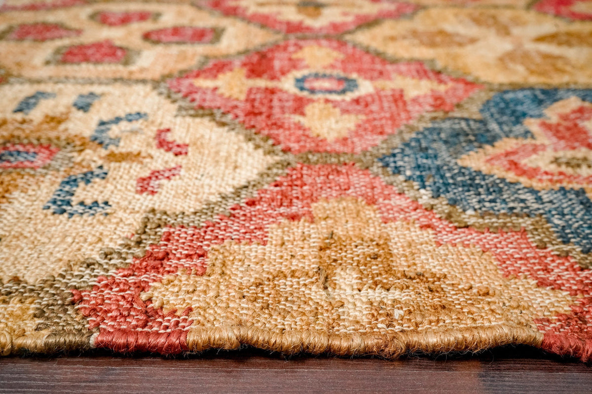 Red jute rug under a dining table lifestyle shot