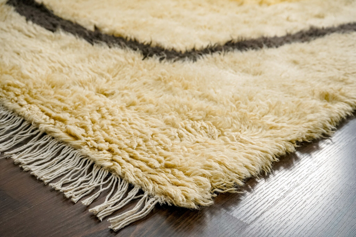 Berber rug shown styled with furniture