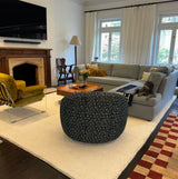 Ivory wool rug styled in a living room