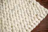 Ivory chunky looped wool rug, full flat view