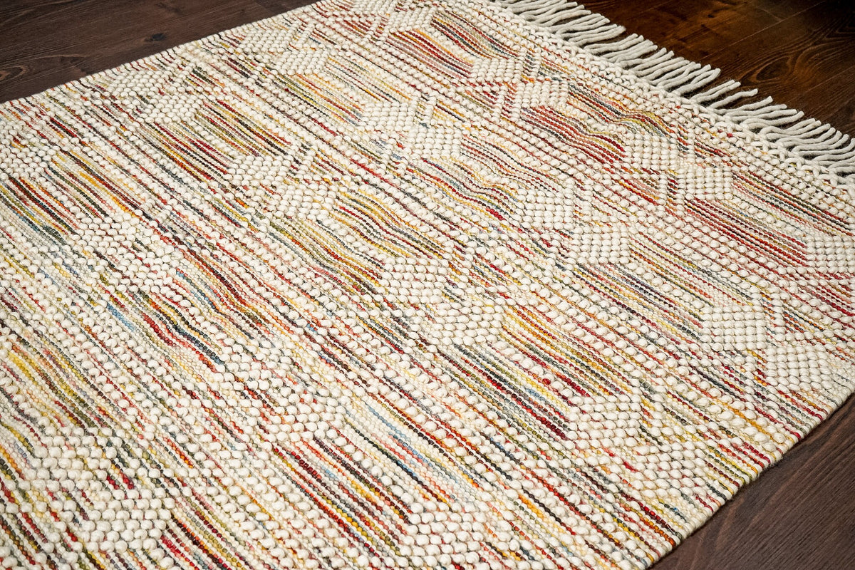 Chunky looped wool rug texture macro shot