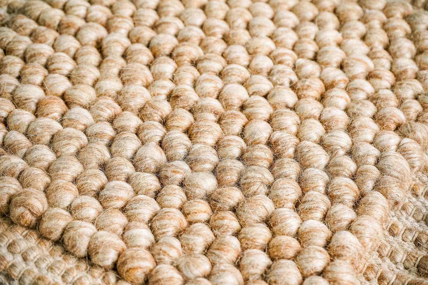 Chunky beige wool rug, flat lay view