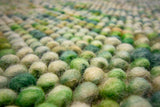 Sage green rug corner detail