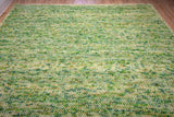 Sage green rug styled in hallway