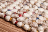 Taupe rug loop pattern detail