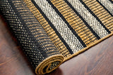 Striped jute rug styled in a living room