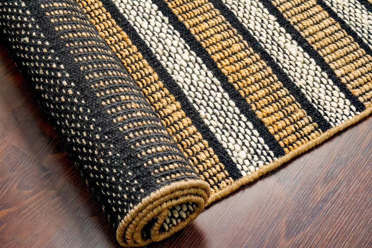 Striped jute rug styled in a living room